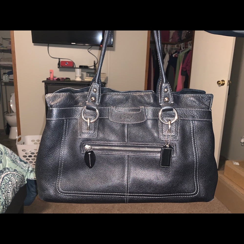 Black leather 3 divider Coach bag.
